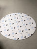 Forrest Baby Blue round playmat. Side A has a blue geometric pattern