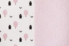 Two sides of Forrest Blush playmat. Side A has a pink geometric pattern and side B has a tree and bear pattern. 